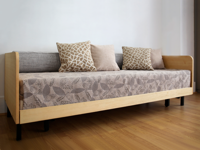 Canapé lit CUBA en bois clair et tissu bleu chiné, Confort compact et style scandinave pour votre salon.